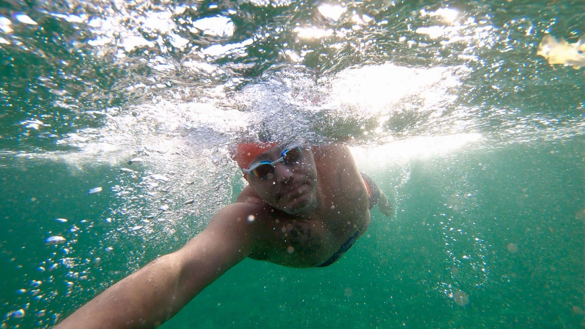 Luke Richards swimming in the ocean