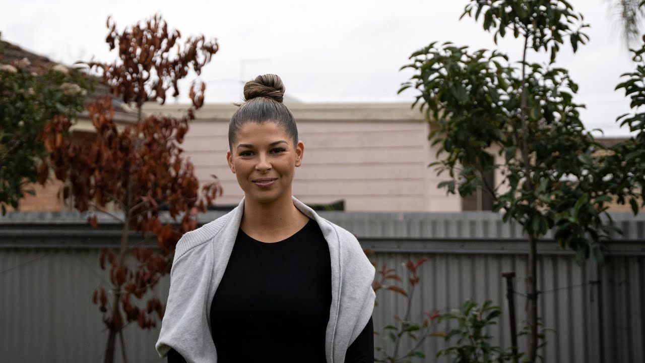 Photo of woman looking to camera.