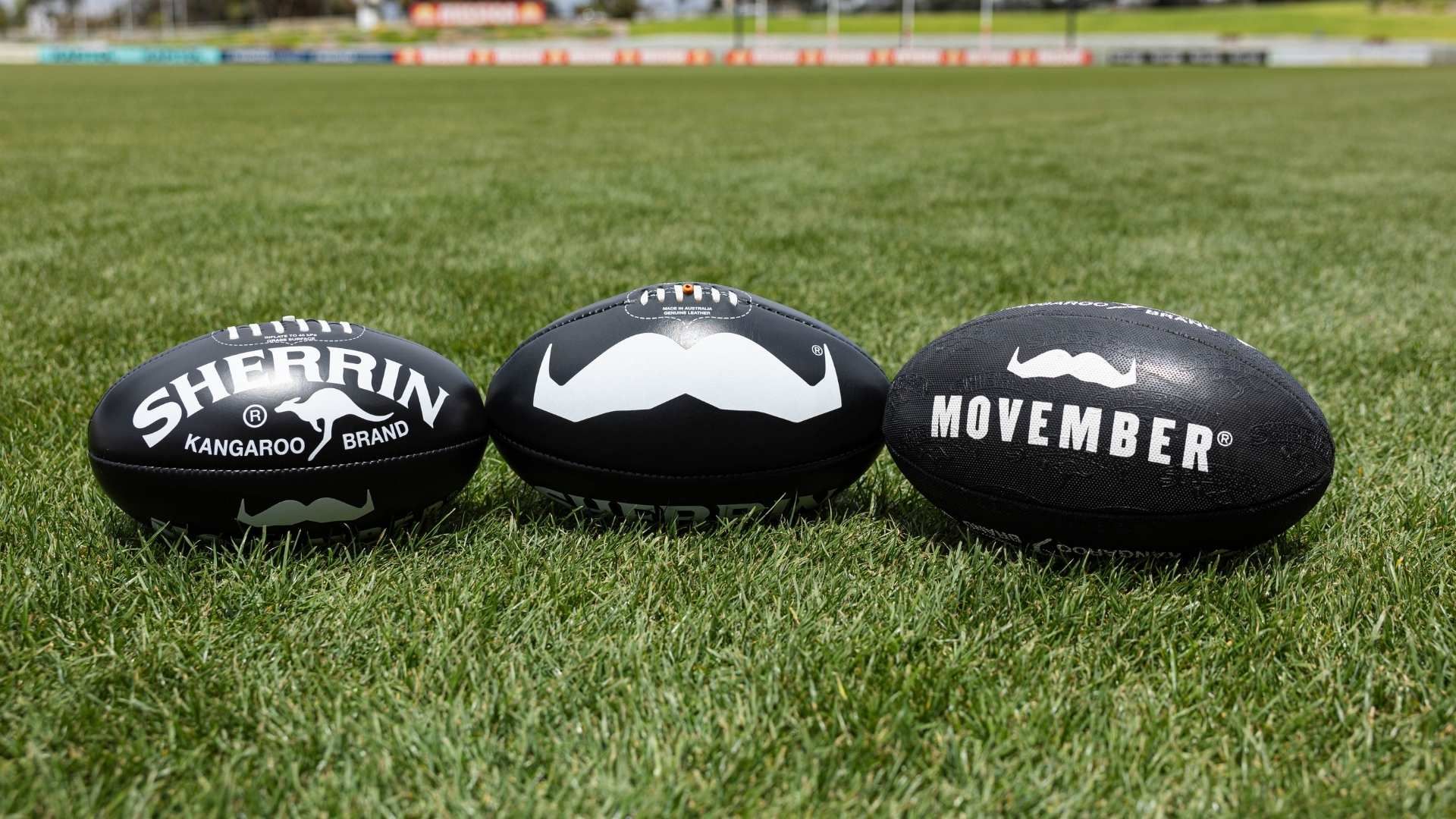 Photo of Movember-branded Sherrin footballs